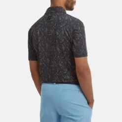 FootJoy Digital Camo FJ Print Lisle Golf Polo Shirt 11 FootJoy Digital Camo FJ Print Lisle Golf Polo Shirt -Calla Golf Club Shop FootJoy SS22 Digital Camo FJ Print Lisle Golf Polo Shirt Black 88437 Model 3