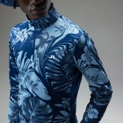 J.Lindeberg Emanuel Print 1/4 Zip Golf Sweater -Calla Golf Club Shop J.Lindeberg AW22 Emanuel Print Mid Layer GMJS07417 0470 SWLIN088 Hibiscus BlueNavy PeonyWhite Model 2