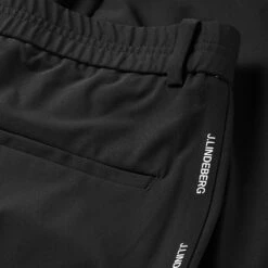 J.Lindeberg Stuart Stripe Golf Trouser 8 J.Lindeberg Stuart Stripe Golf Trouser -Calla Golf Club Shop J.Lindeberg SS22 Stuart Stripe Golf Trouser Black GMPA05716 9999 Code TRLIN022 34 W 32 Leg Detail
