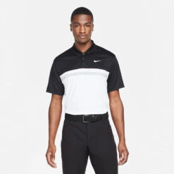 Nike Dry Victory Colourblock Golf Polo Shirt 9 Nike Dry Victory Colourblock Golf Polo Shirt -Calla Golf Club Shop Nike SS22 Dry Victory Colourblock Golf Polo Shirt DH0845 010 M Black White Smoke Grey model 1